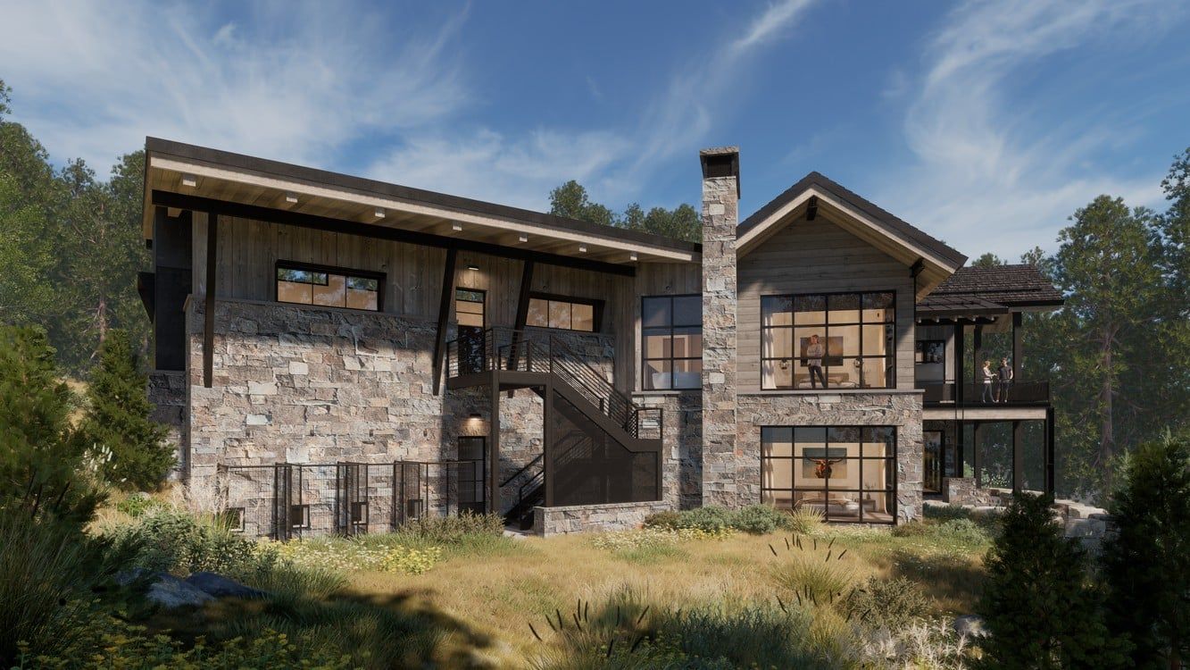 A large stone house is sitting on top of a hill surrounded by trees.
