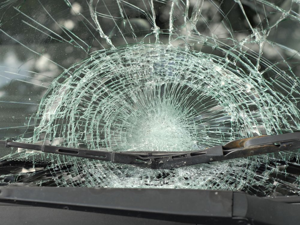 Cracked Car Windshield with Shattered Glass and Damaged Wiper Blades — Eurobodalla Windscreens in Mogo, NSW