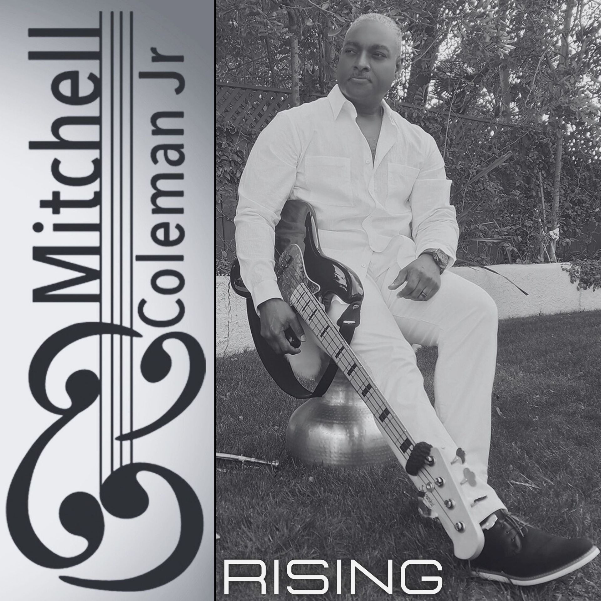 Album cover: man in white suit sits on a black stool with a guitar; text reads “Mitchell Coleman Jr – Rising”