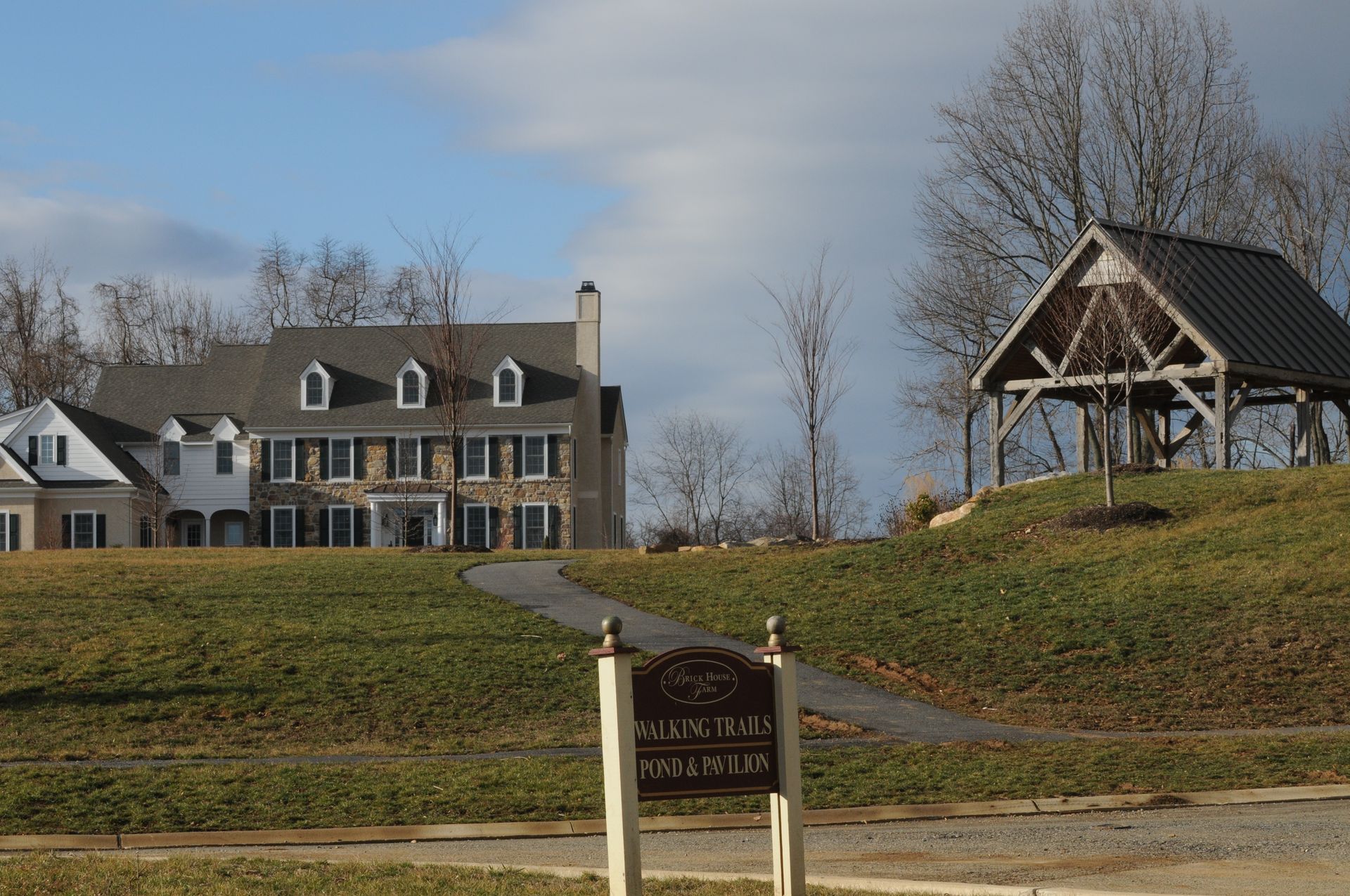 A large house with a sign in front of it that says glen ridge