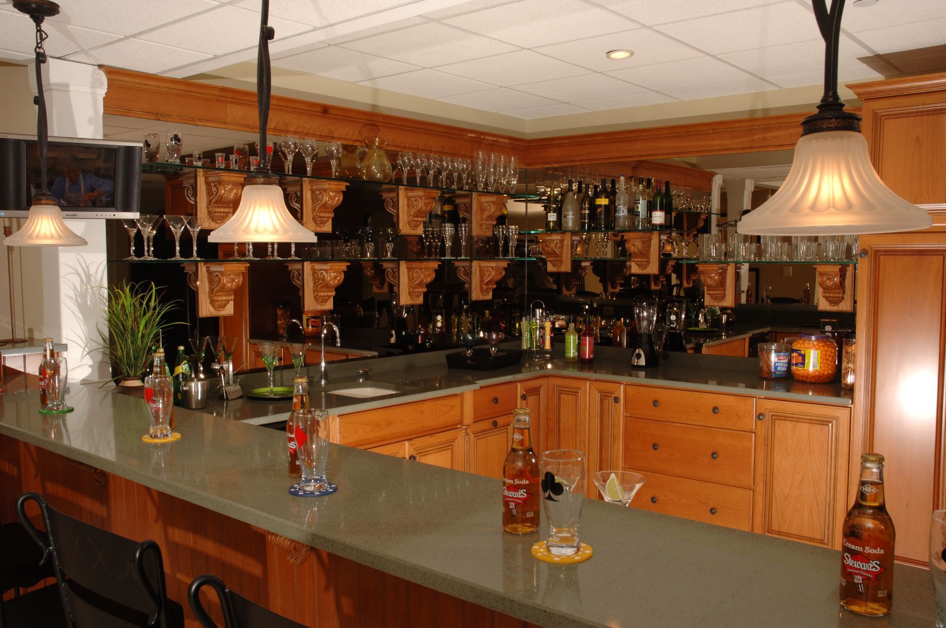 A bottle of rum sits on a counter in a kitchen