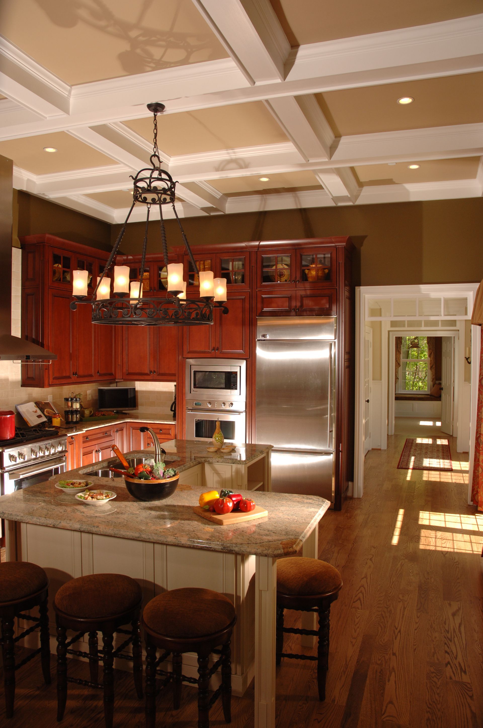 A kitchen with stainless steel appliances and a large island