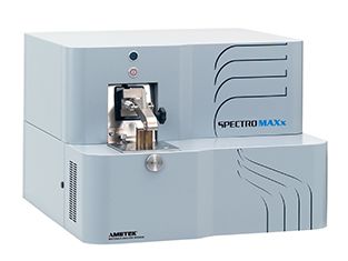 白色桌上放著一台 Spectromaxx 機器。