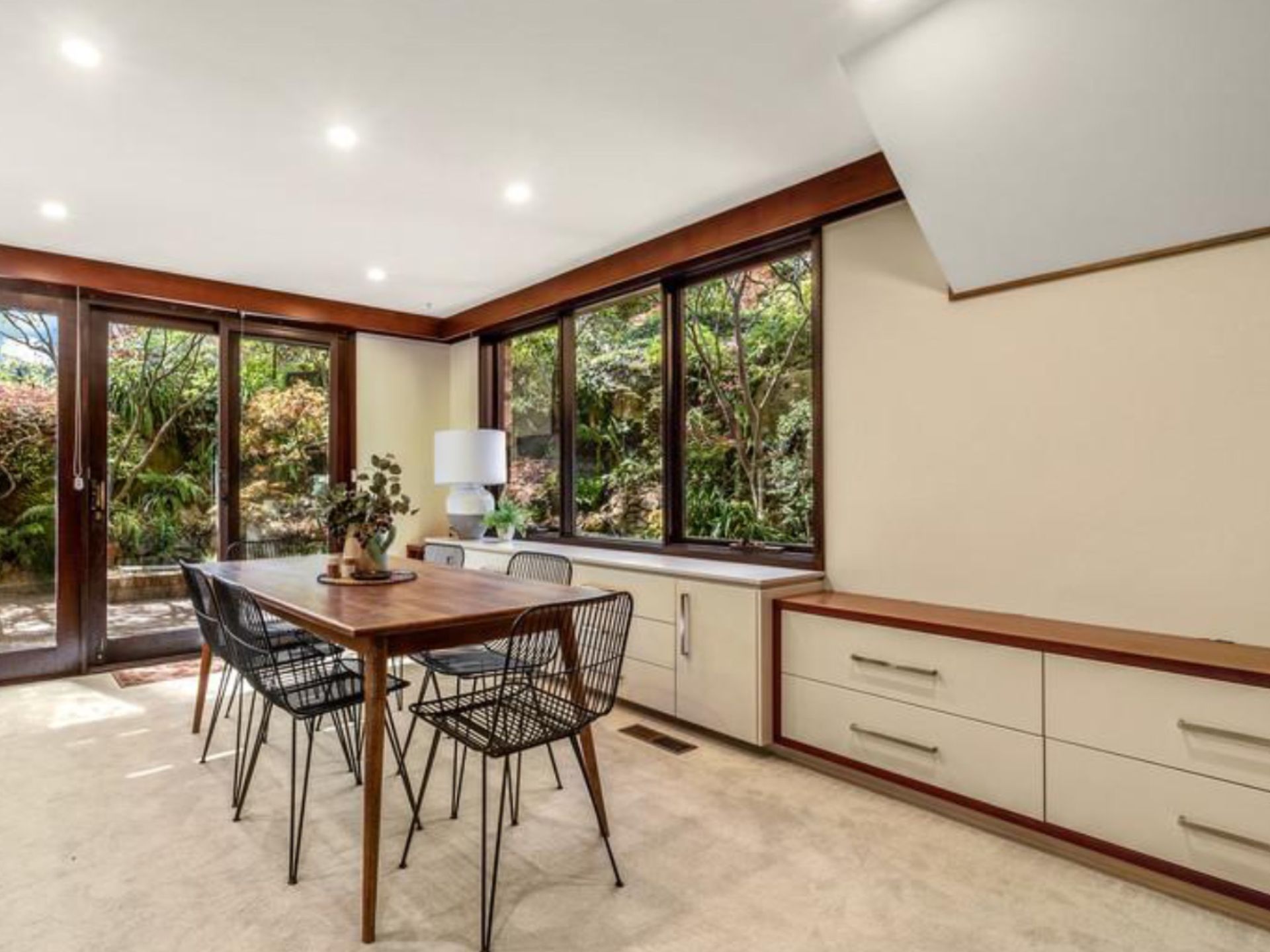 A Beige Room with Large Windows, Kitchen Table and Chairs - A&J Painting In Gungahlin, NT