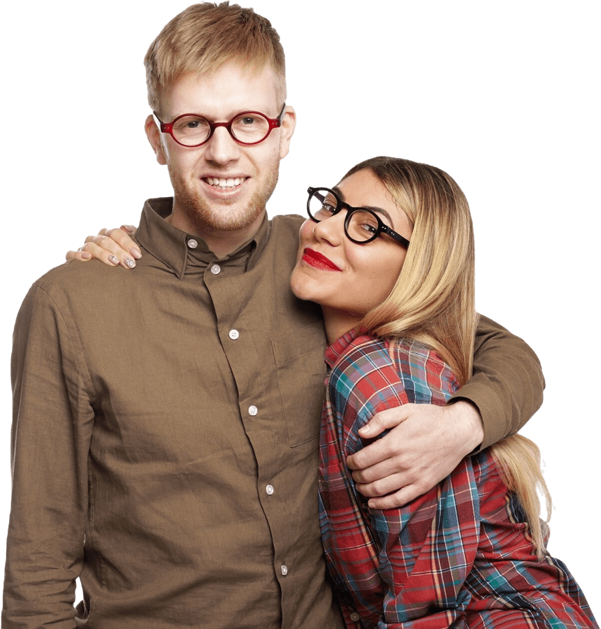 A man and a woman wearing designer frames are hugging each other.