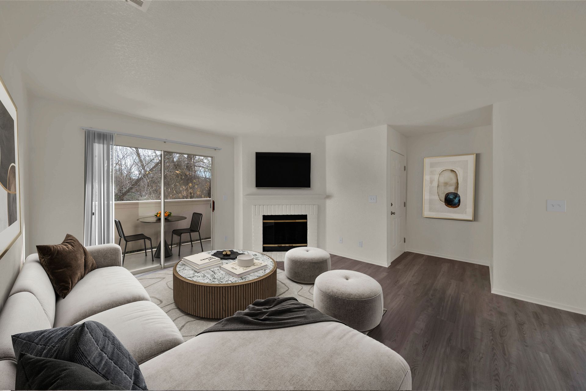 2 Bedroom, 2 Bathroom - Living room with view of wood burning fireplace with mantle and sliding glass door to outdoor patio/balcony.