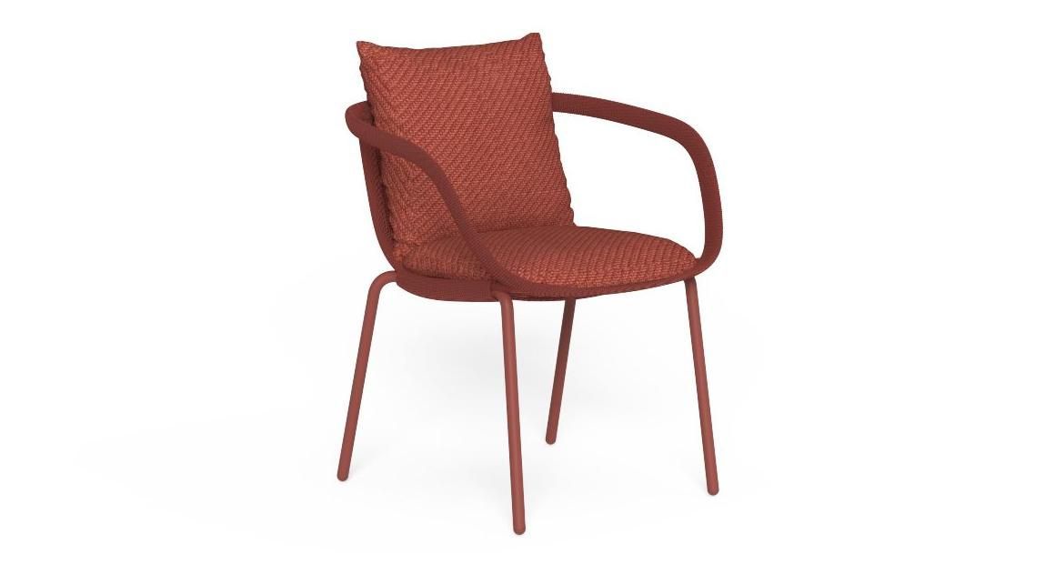 Red outdoor chair with curved arms and legs on a white background.