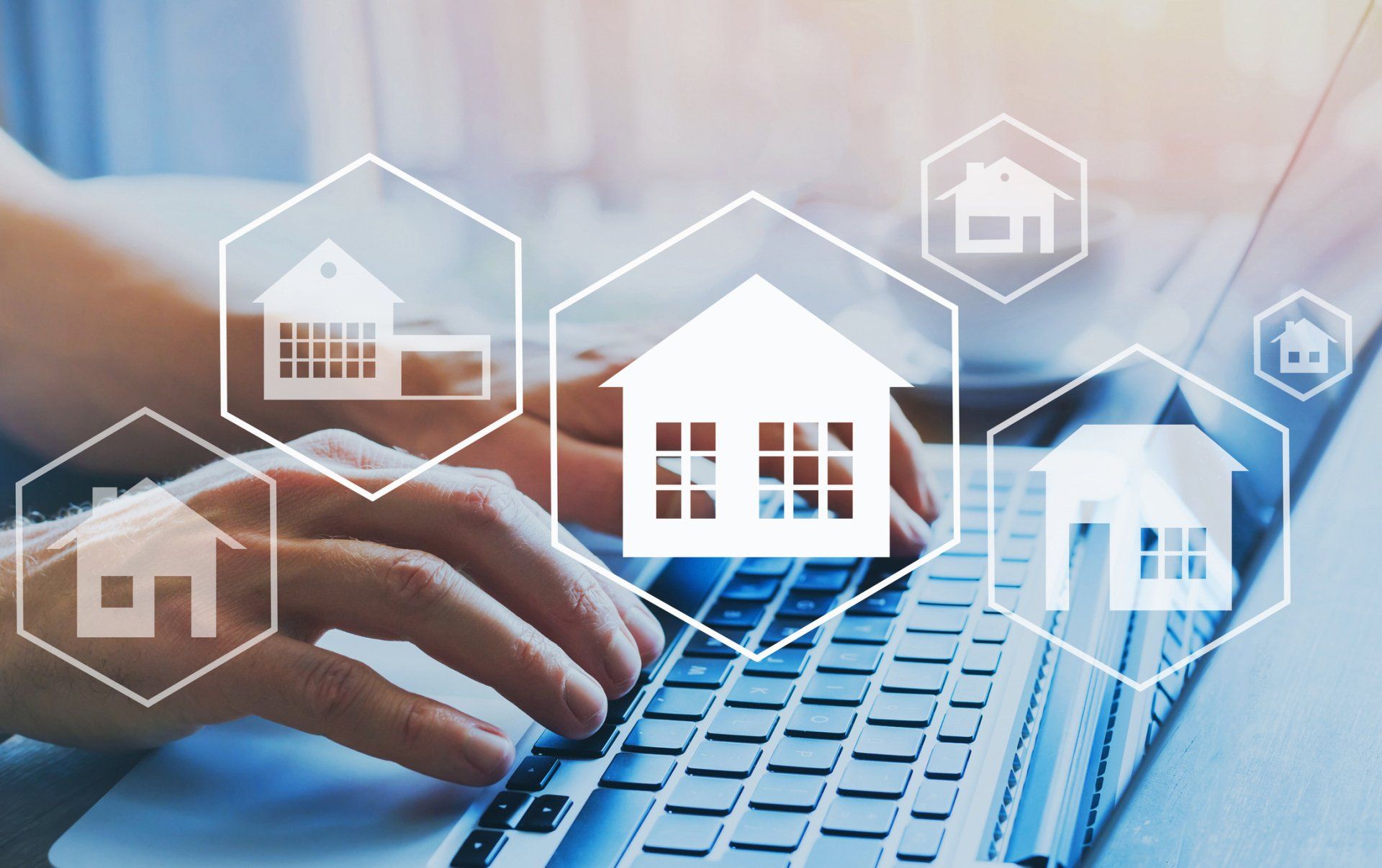 Real Estate Concept — Chesterfield, MO — BJZ Realty A person is typing on a laptop computer with houses coming out of the screen.