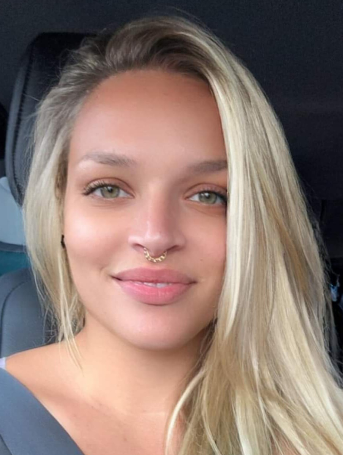 A woman smiling.
