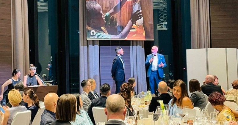 Speaking at a charity gala fundraiser