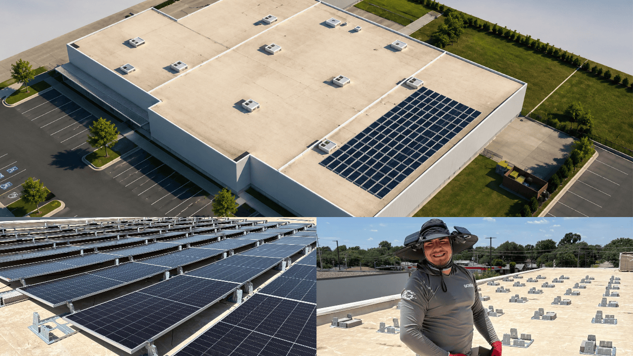 An aerial view of a residential area with solar panels on the roofs