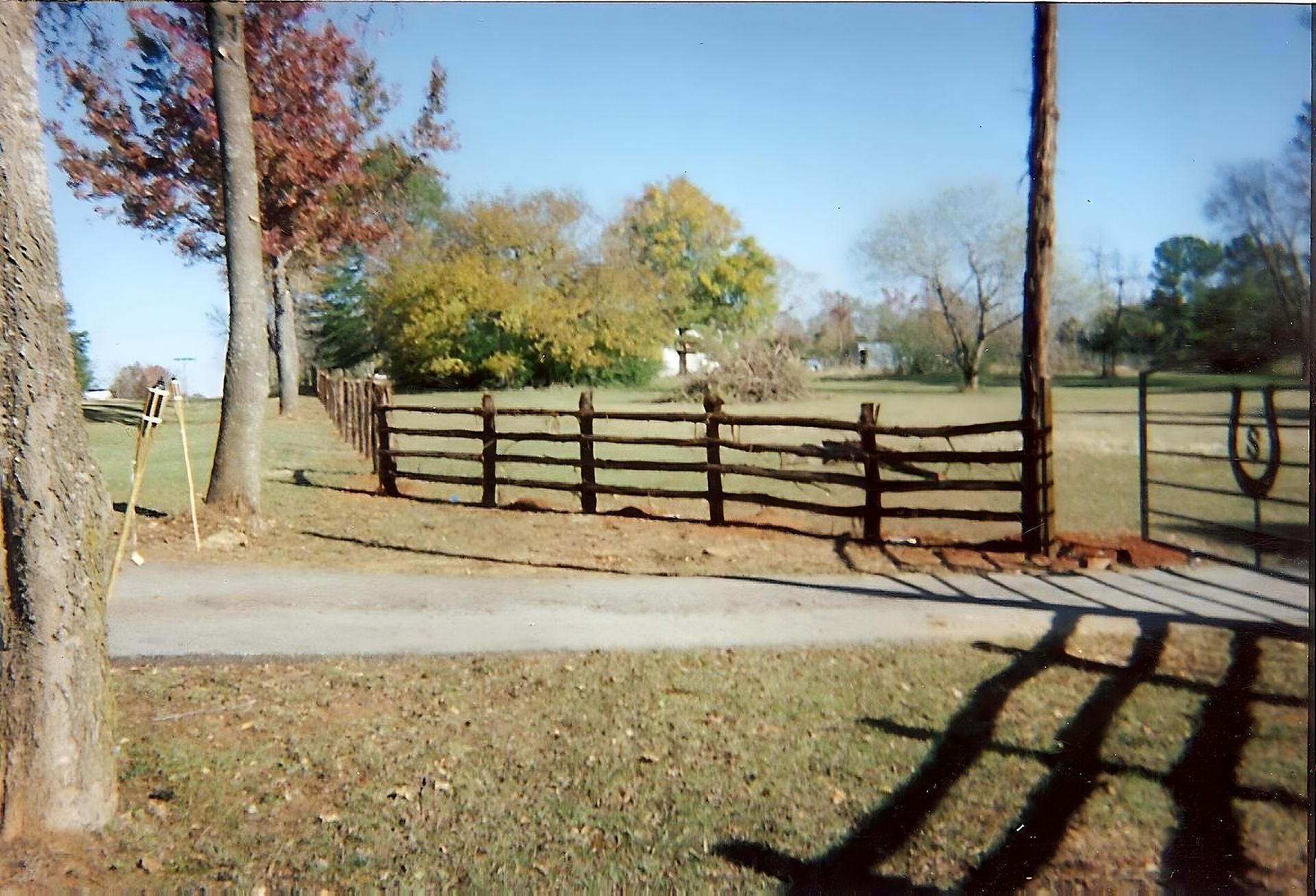 land space picket wood fence