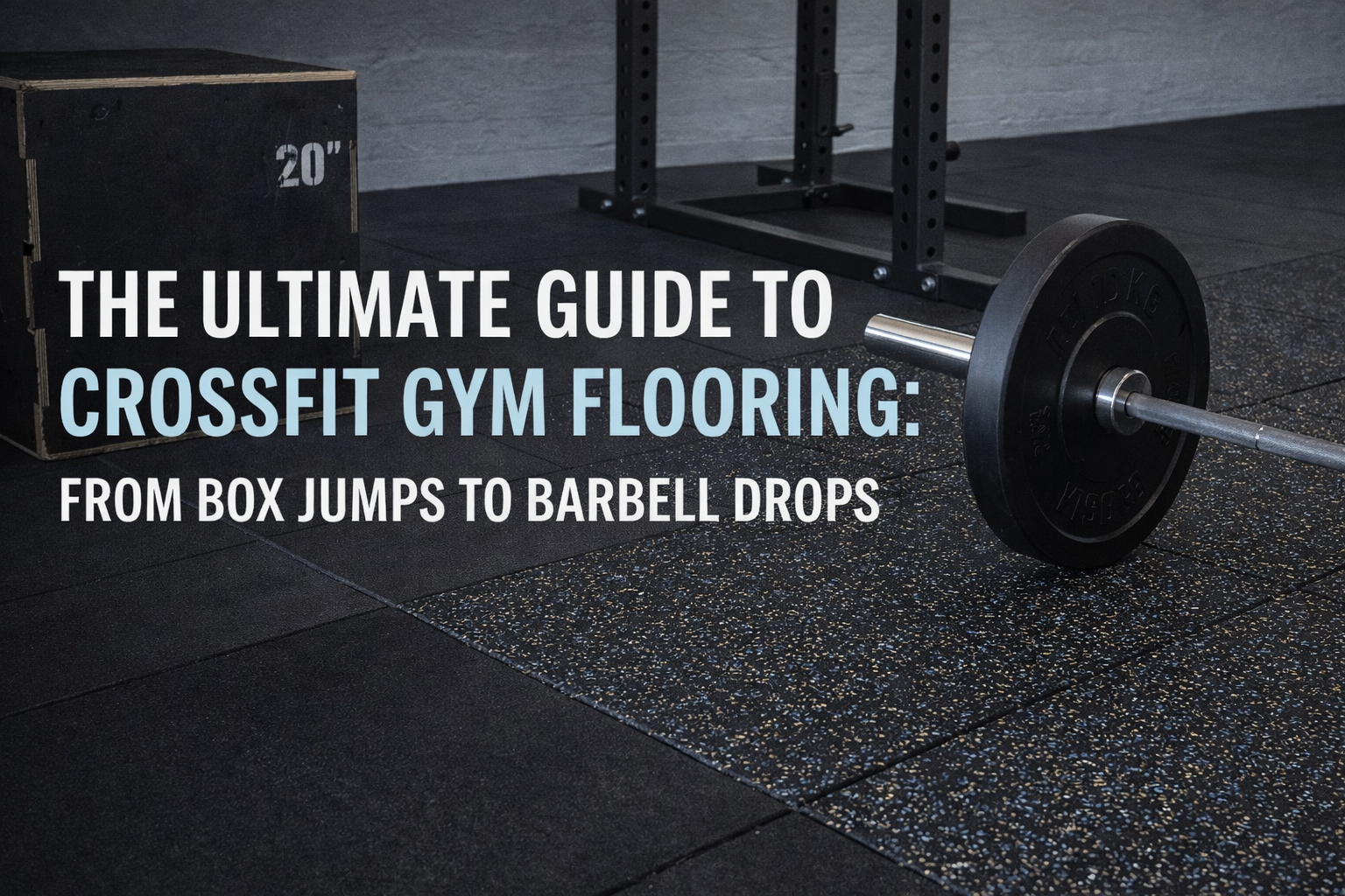 A CrossFit gym floor featuring a black plyo box, a barbell with plates, and the text