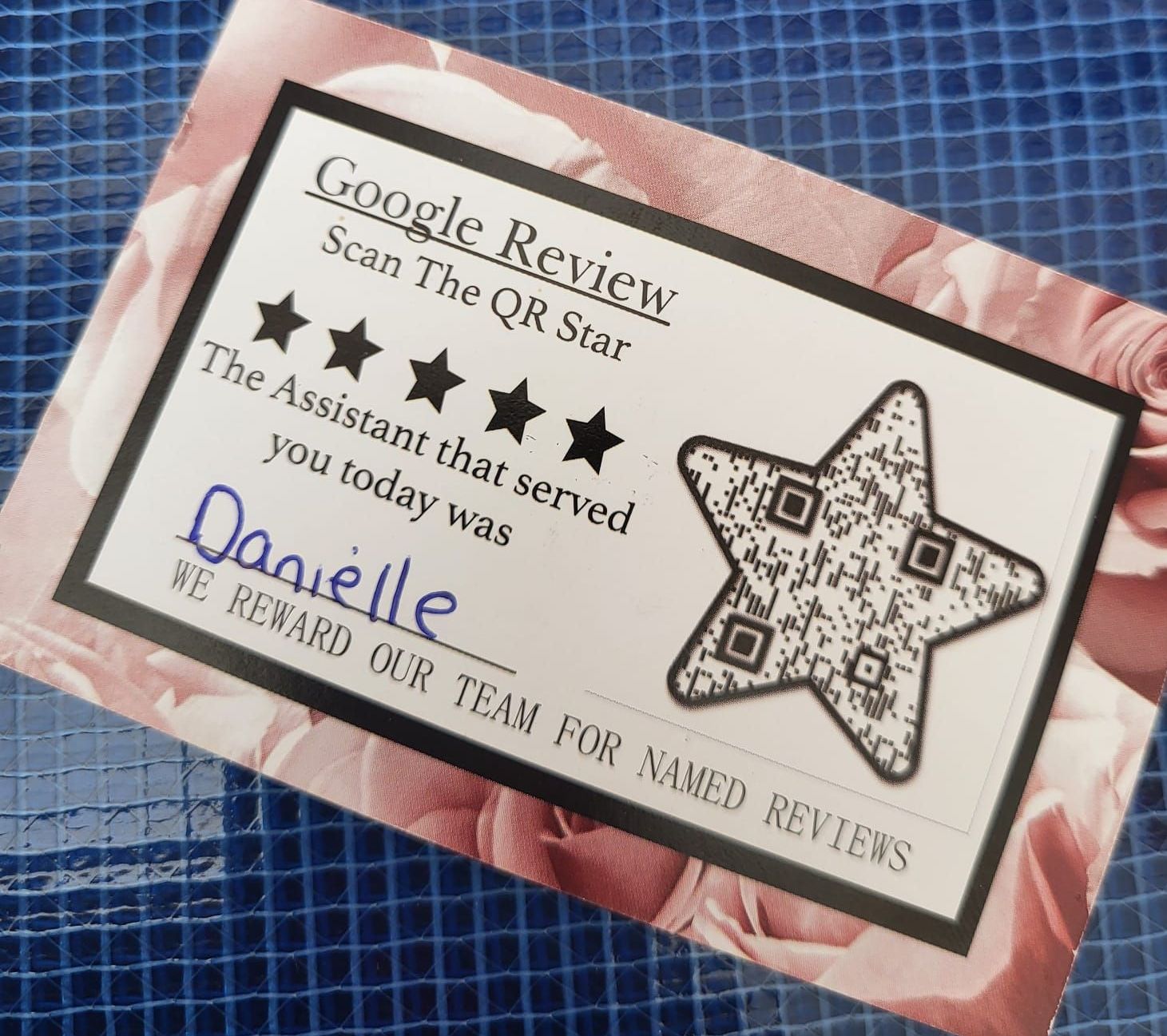 Carriage & Castles in Dublin 1 hand customers a business card as they leave and ask for a review. Cleverly, the card has a QR code to take the customer to their Google My Business page, a space for the staff member's name and a note saying that they reward their team for named reviews.n