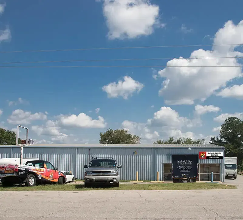 Vehicles in Front of Our Service in Raleigh, NC - MJ Brothers Auto & Truck Repair