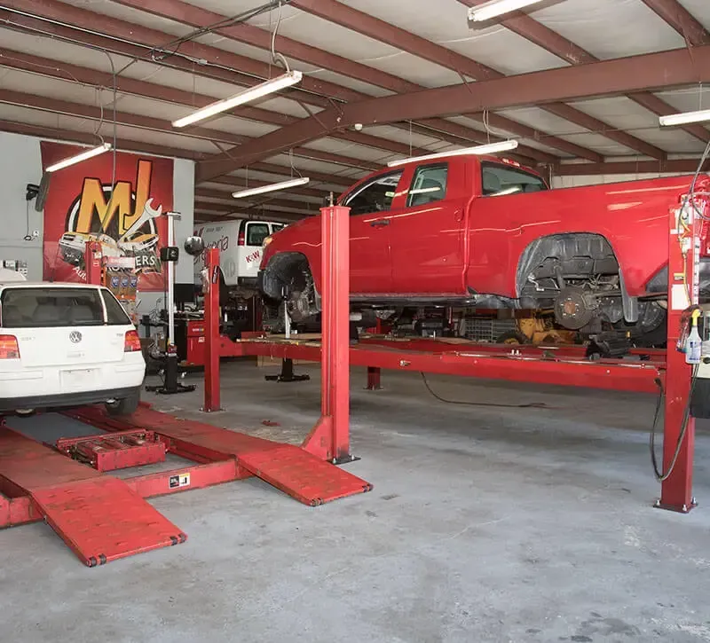 Vehicle on Lift in Our Service Center in Raleigh, NJ - MJ Brothers Auto & Truck Repair
