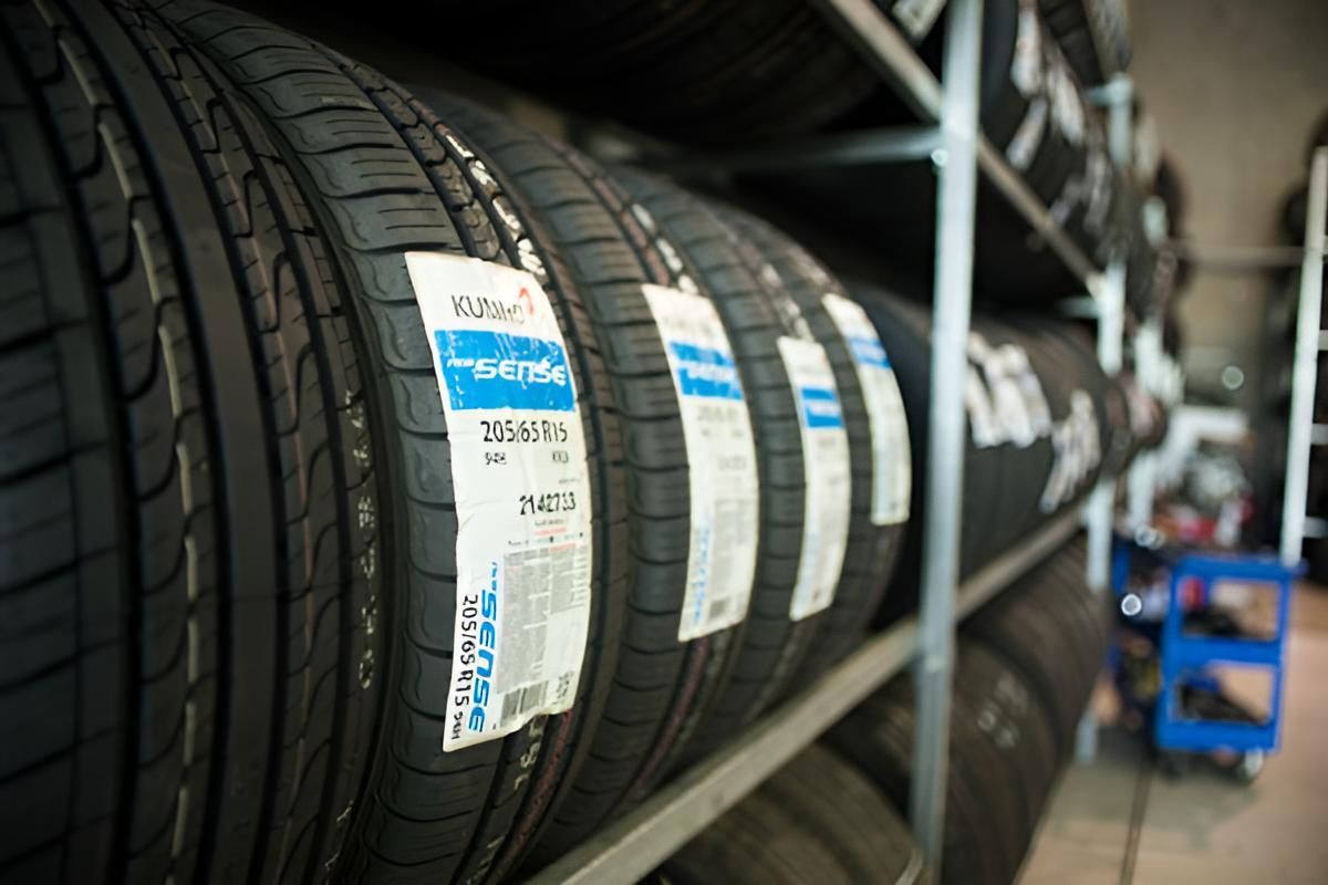 A Stack of Tyres Sitting on Top of Each Other — Envy Automotive in Gorokan, NSW