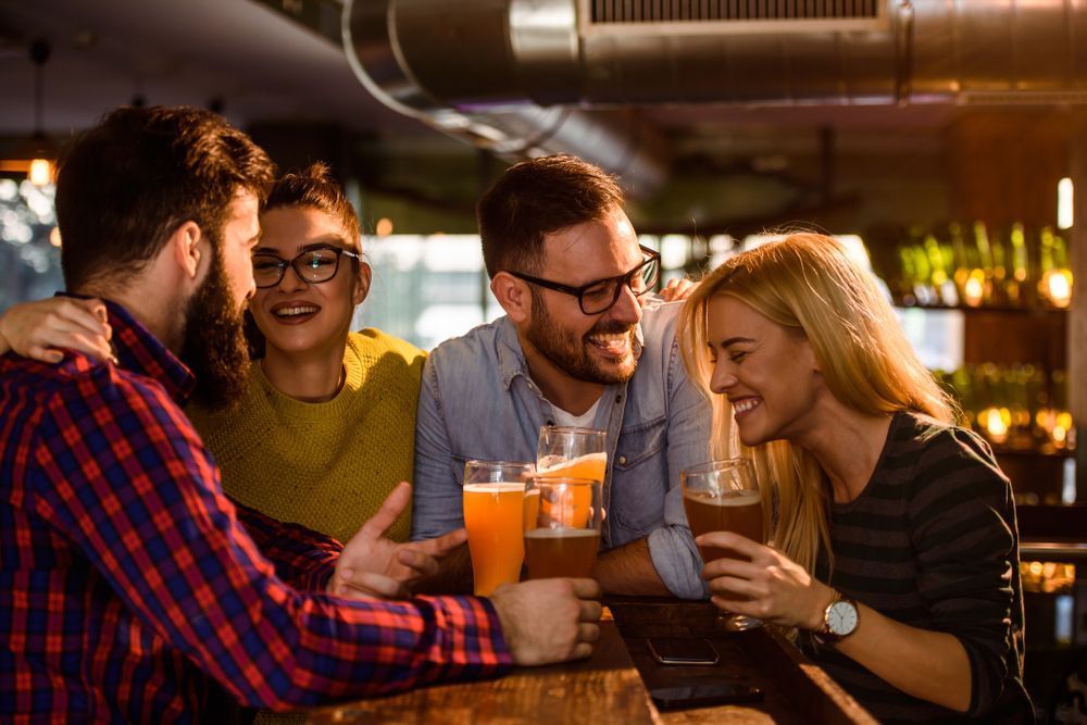 Friends in The Pub Drinking Beer — Pub in Stuart Park, NT