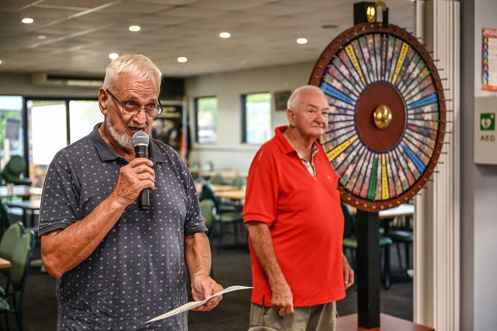 Old Man Holding a Microphone — Pub in Stuart Park, NT
