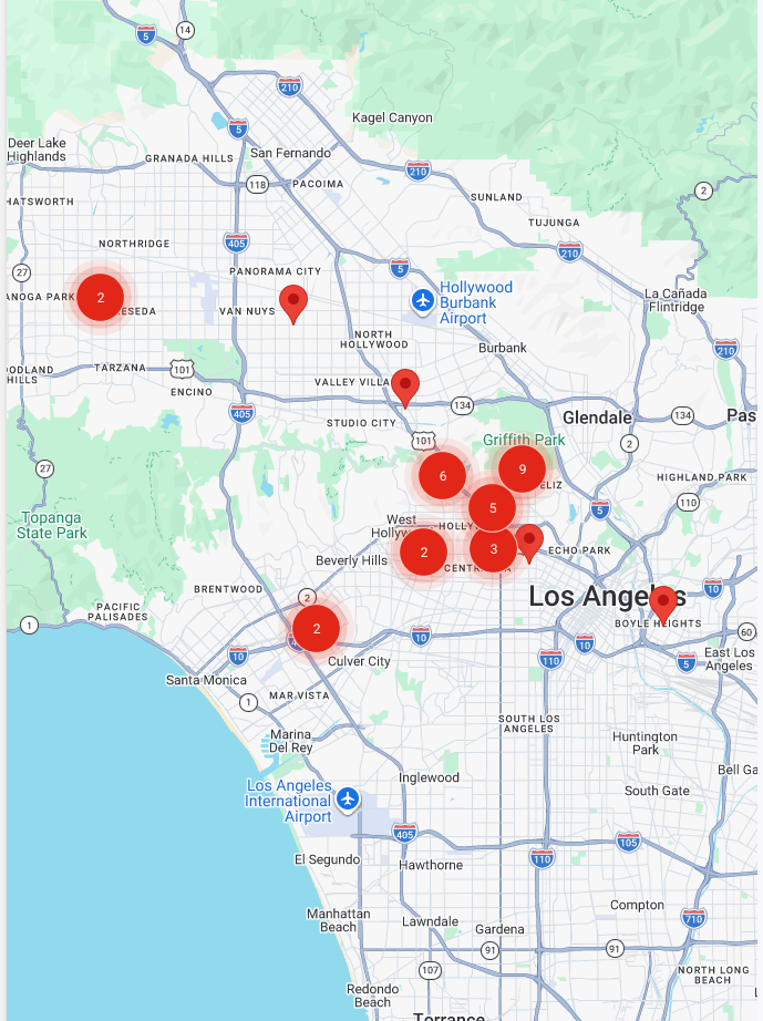 Map of Los Angeles area with several red location pins and blue route markers