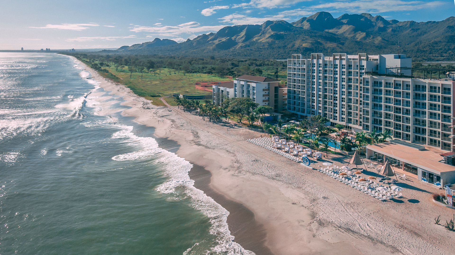 Aerial drone photography of Radisson Riviera Pacifica resort, featured in large-scale commercial advertising.