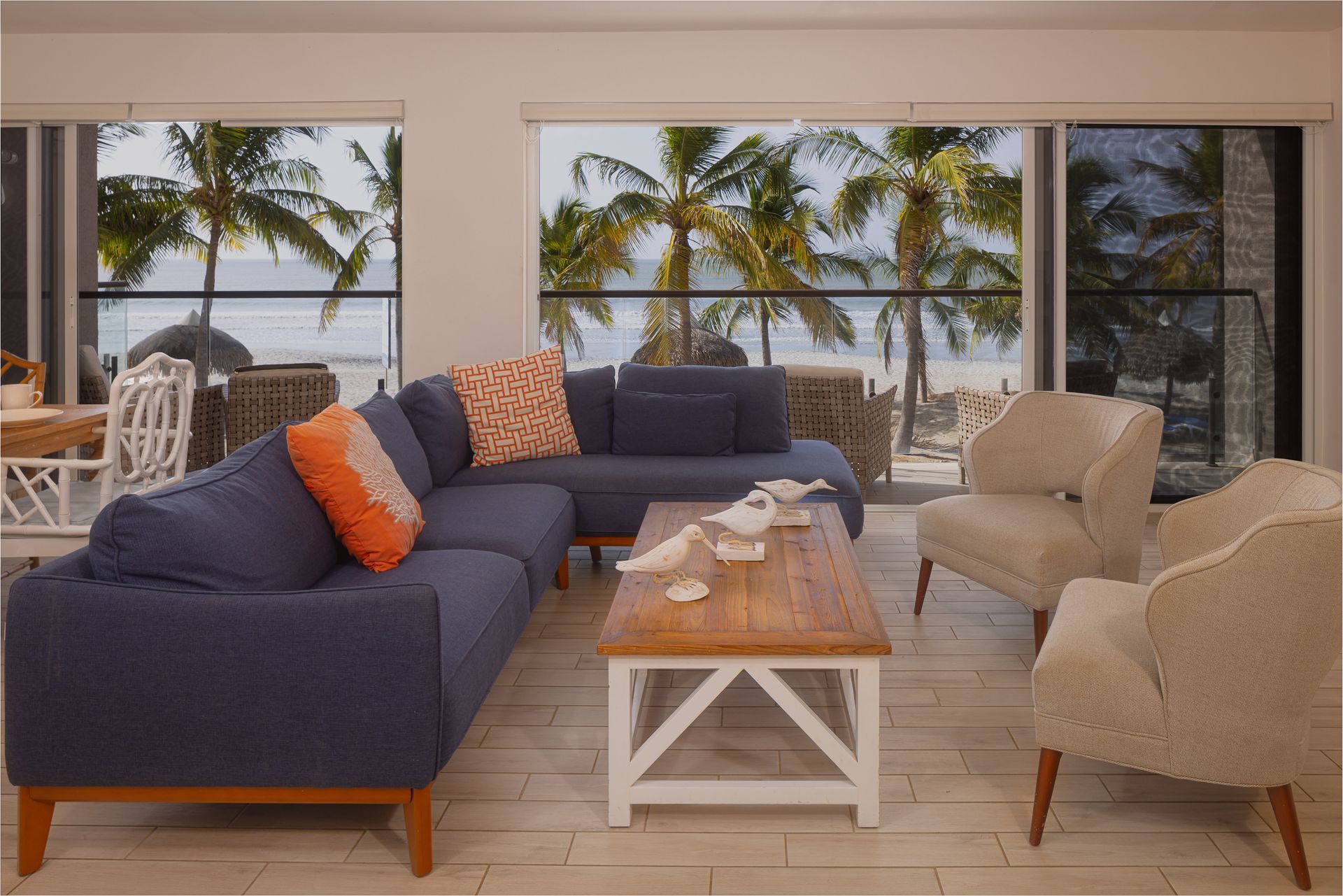 Modern living room interior with panoramic ocean views in the Olas building, Playa Caracol.