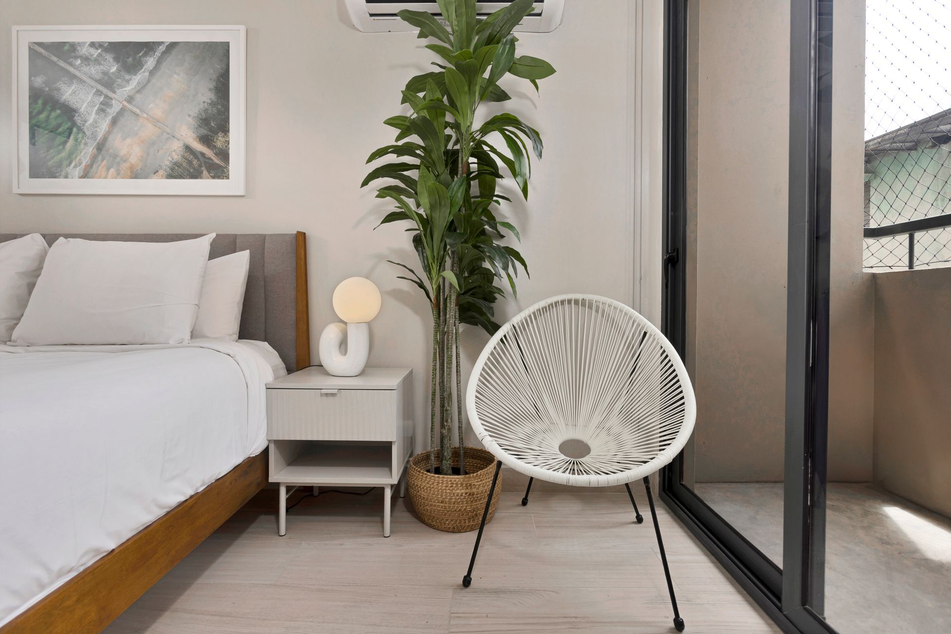 Elegant master bedroom interior in the award-winning Casco View building, featuring modern design and historic