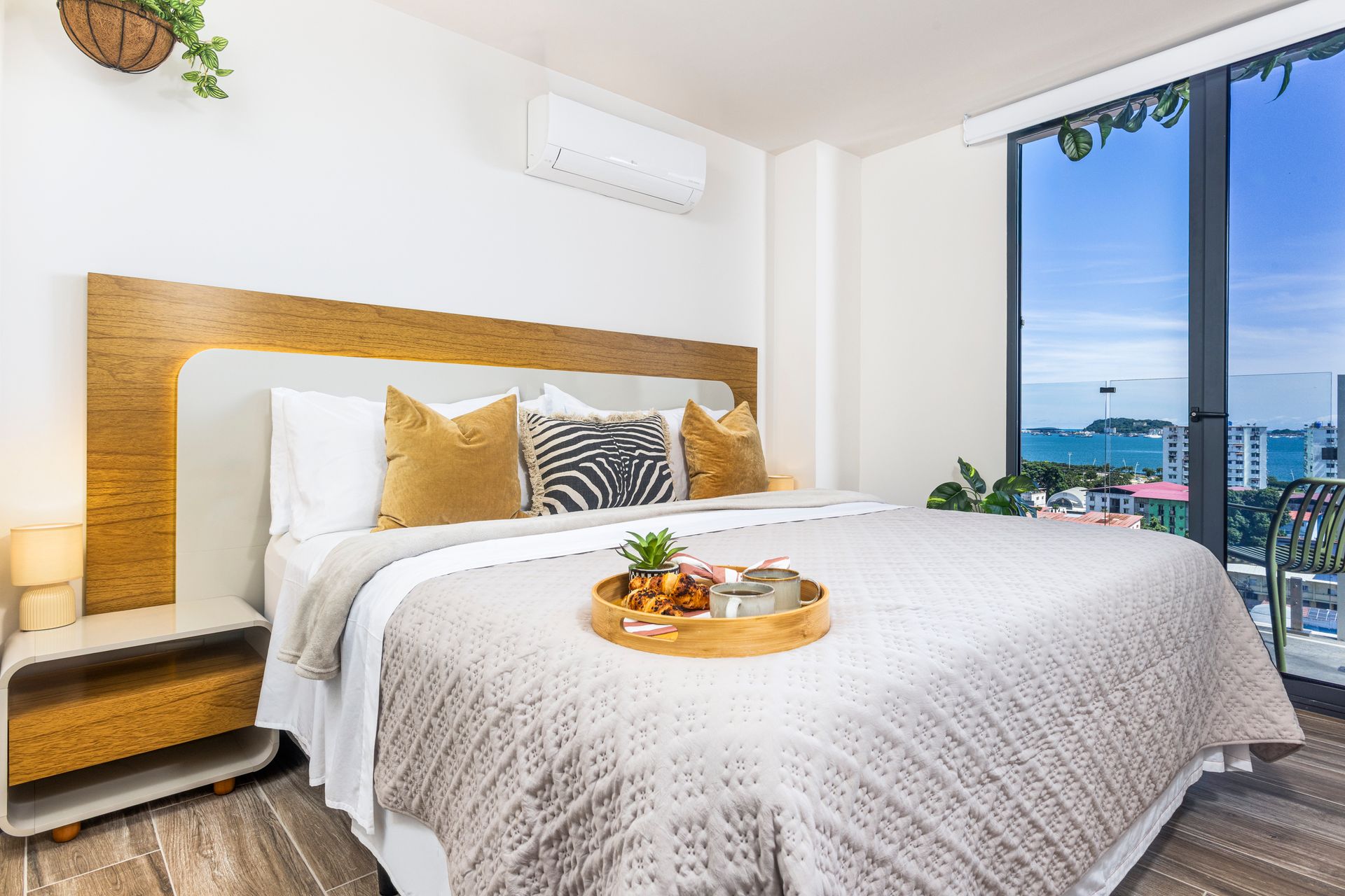 Open-concept Airbnb interior with modern kitchen and living space in the Casco View building.
