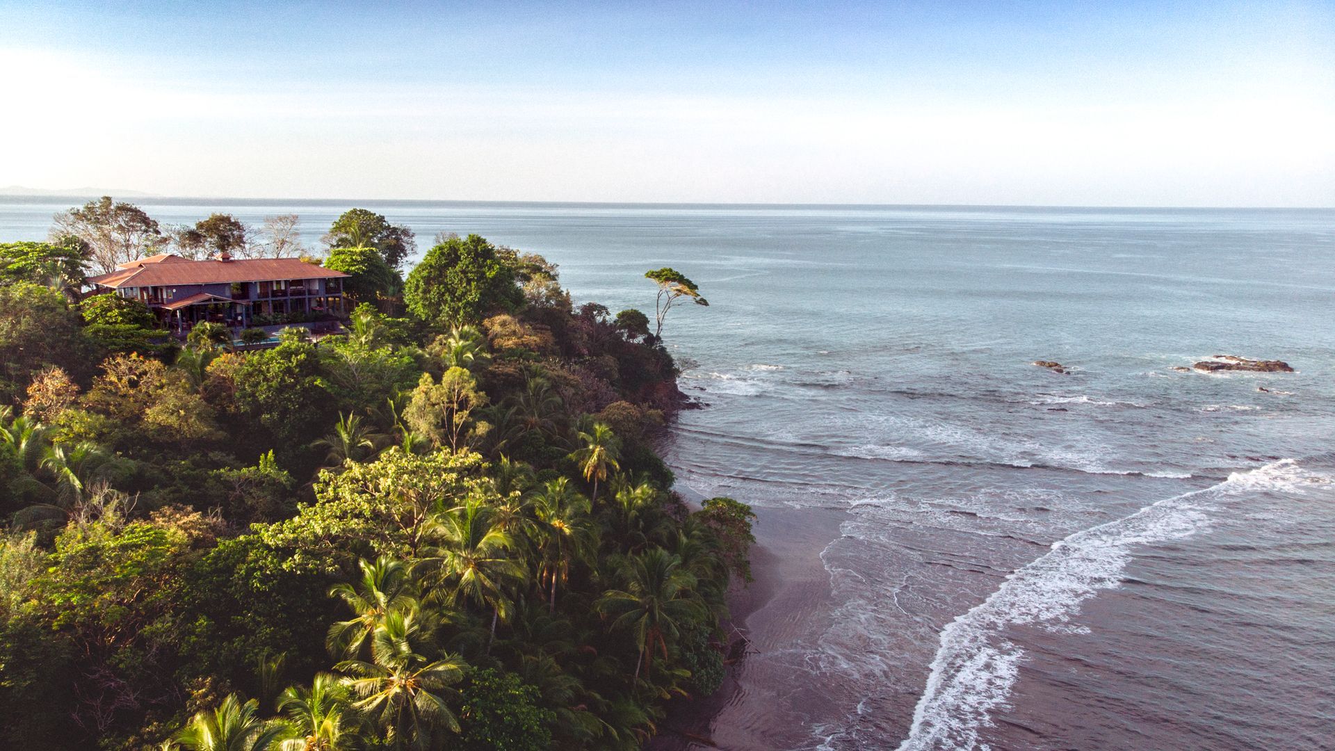 Infinity pool with ocean and sunset views at a luxury boutique hotel in Punta Duarte, Mariato, Veraguas, Panama.