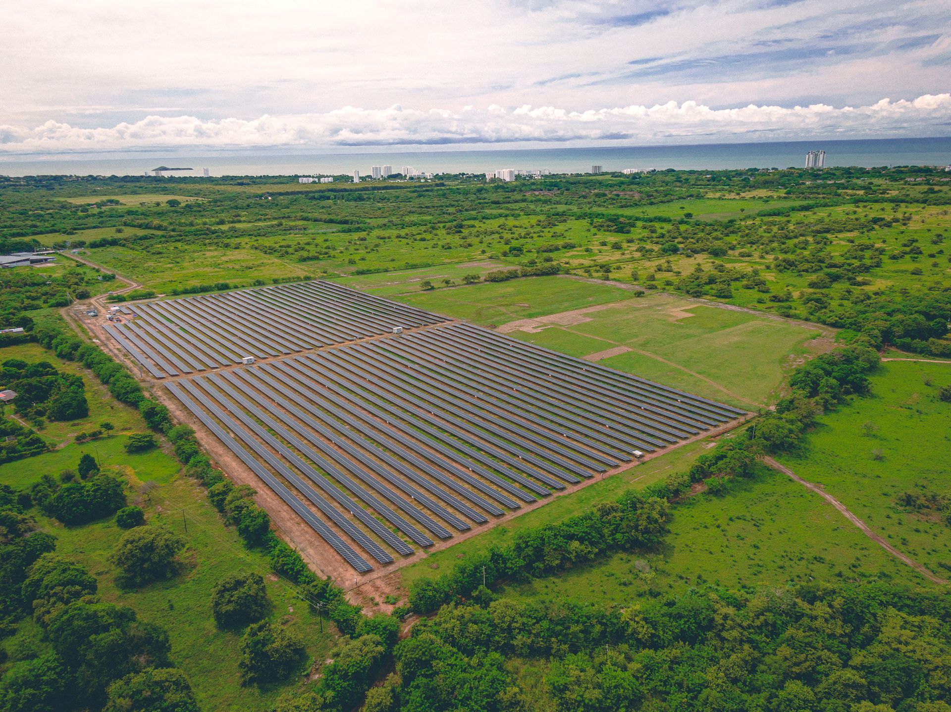 Expansive solar panel field and renewable energy infrastructure in the province of Coclé, Panama.