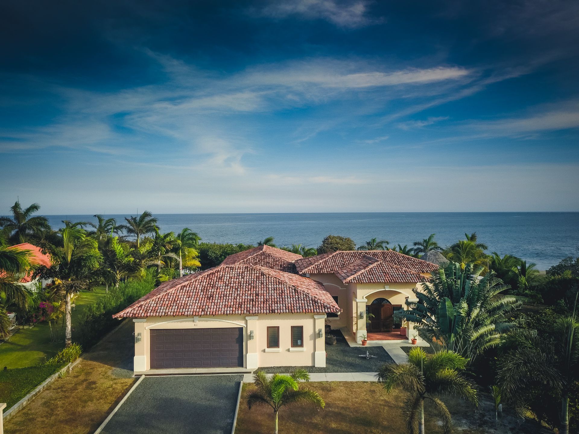 Luxury coastal home architecture with green landscape and ocean views in Pedasí, Los Santos, Panama.