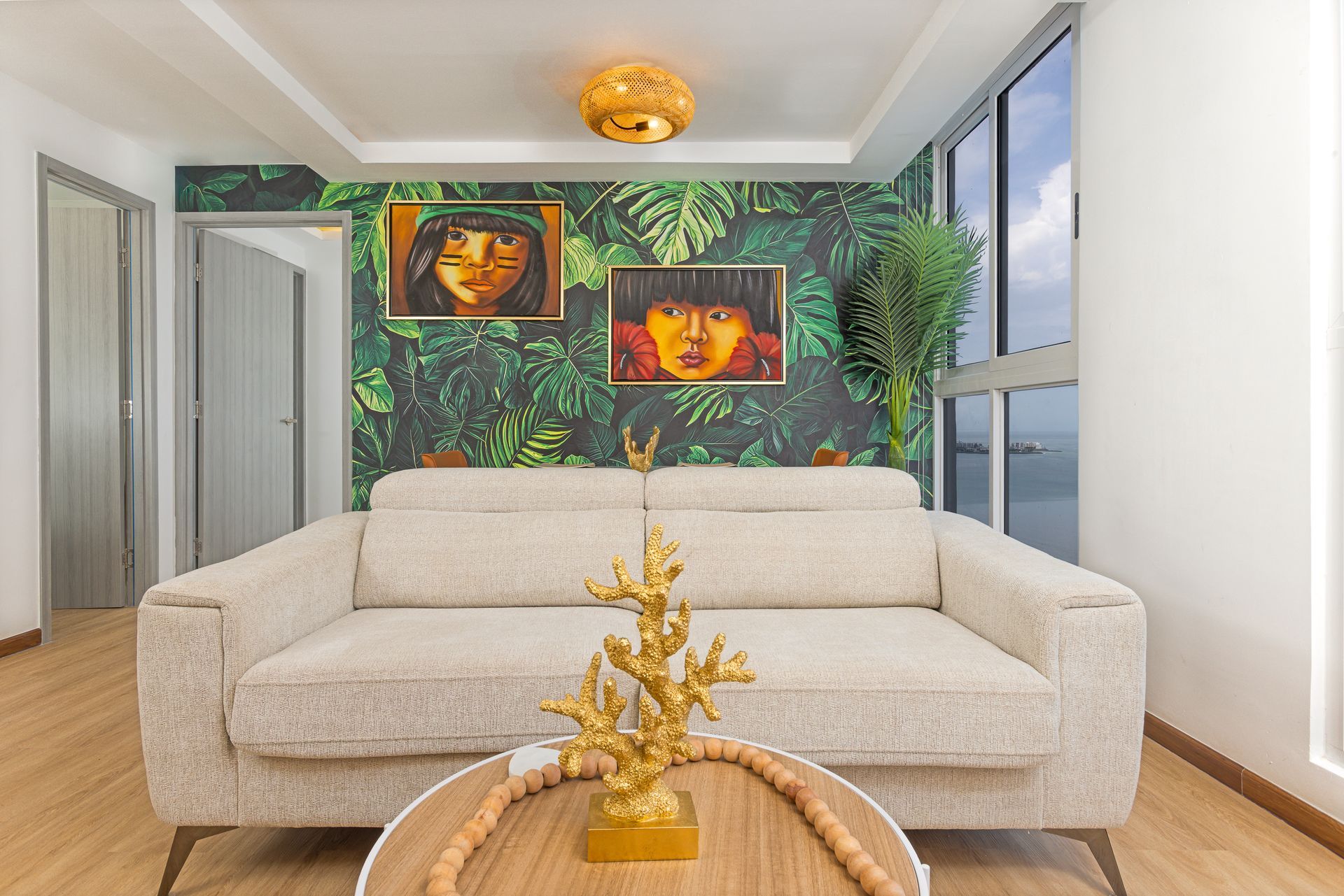 Modern Airbnb living room interior with contemporary furniture and natural light in The Sands, Panama City.