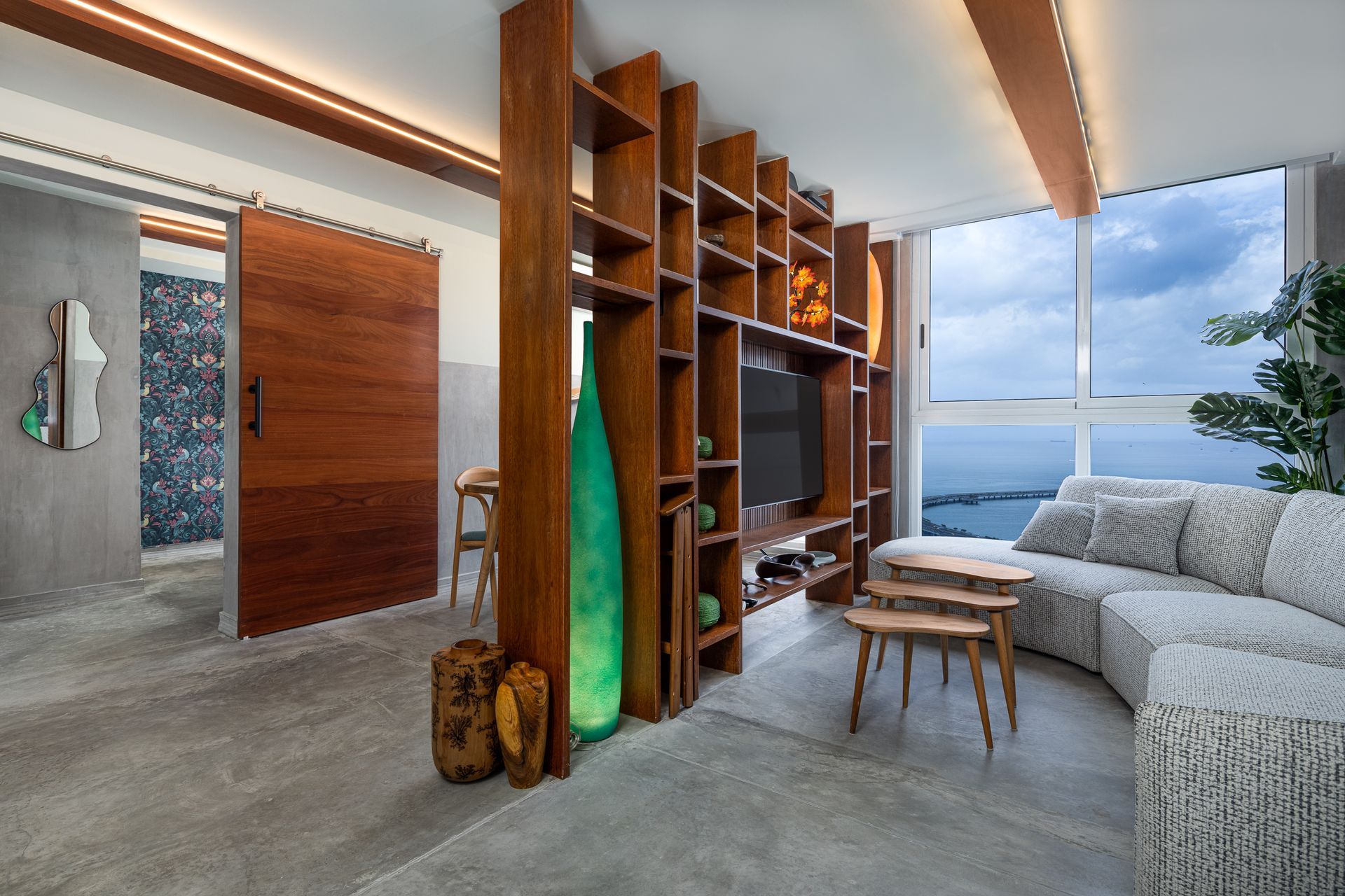 Professional real estate photography of a modern living room with ocean views at The Sands, Panama.