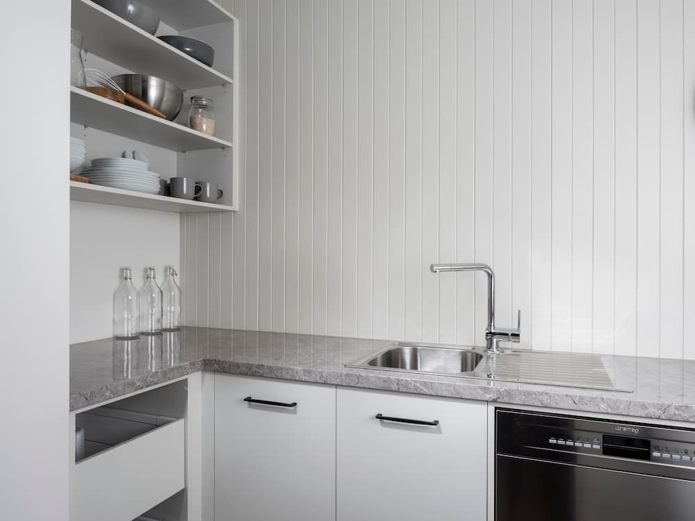 White Kitchen With Kitchenware — Coffs Coast Designer Bathrooms in Toormina, NSW