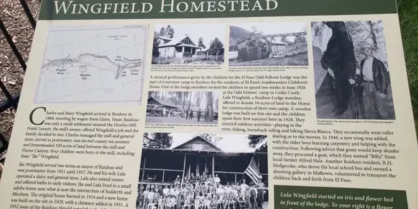A sign that says wingfield homestead on it