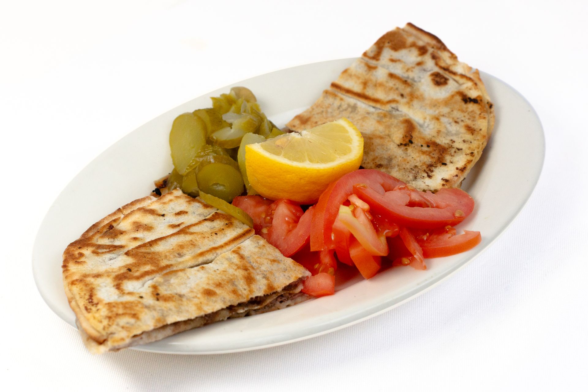 Arayes: grilled pita bread stuffed w spiced ground meat Arayes