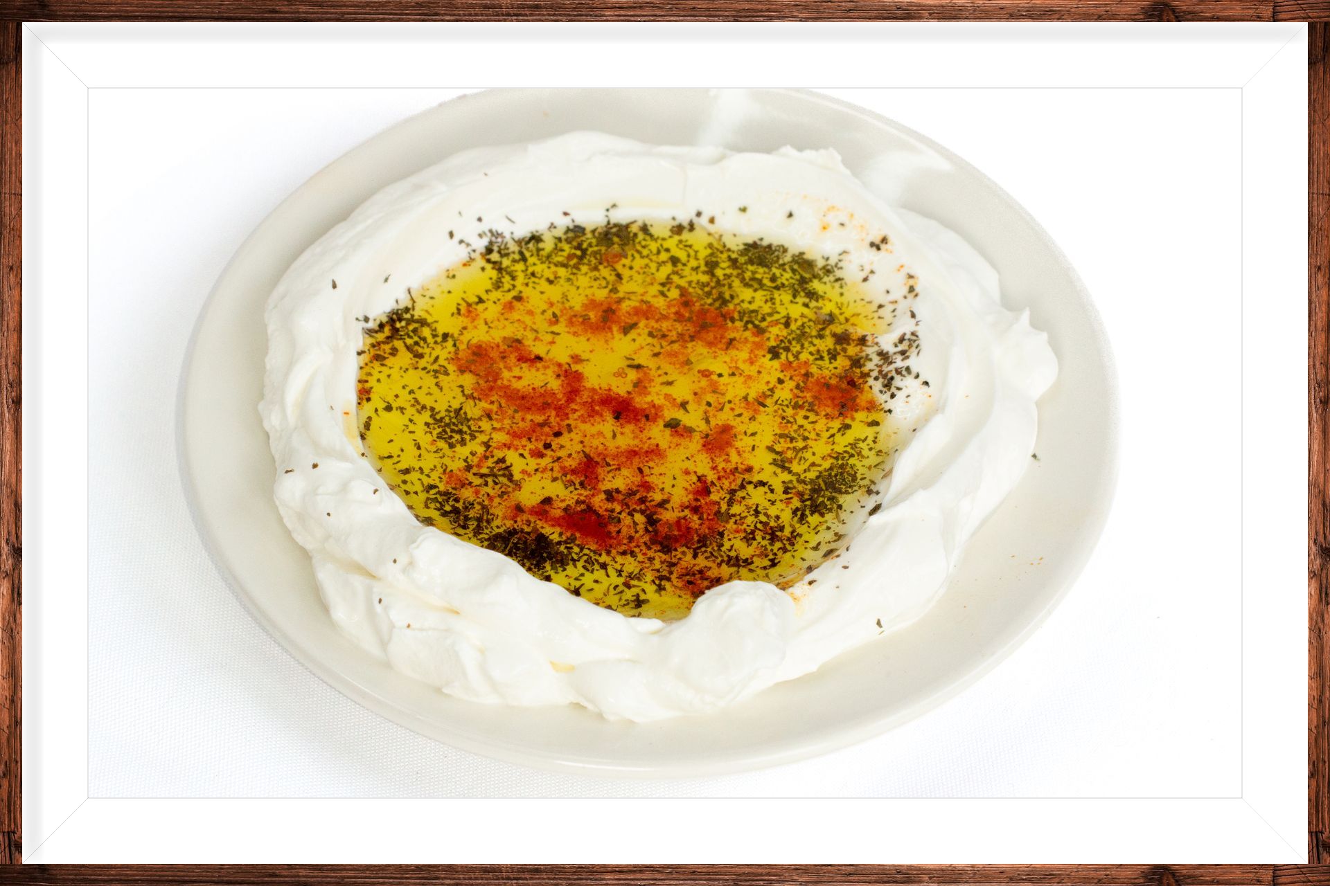 Labneh :Strained yogurt topped w paprika mint olive oil لبنة LABAN