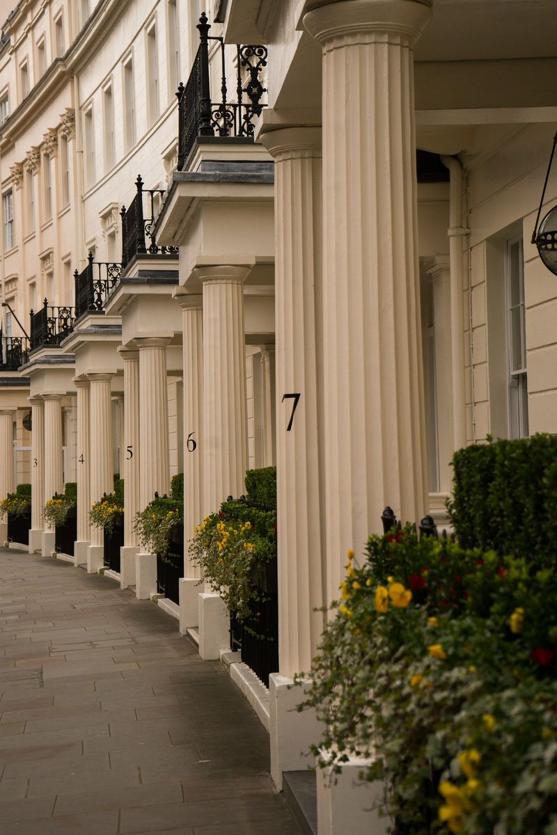 A residential street of stucco houses in London