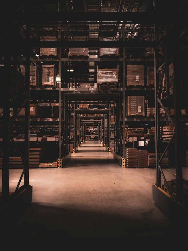 A warehouse aisle with storage racking after hours