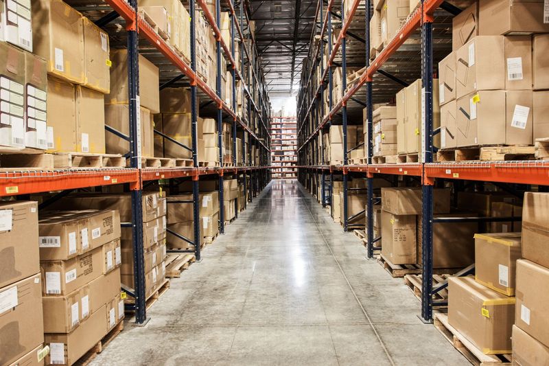 A warehouse interior filled with shelving and boxes