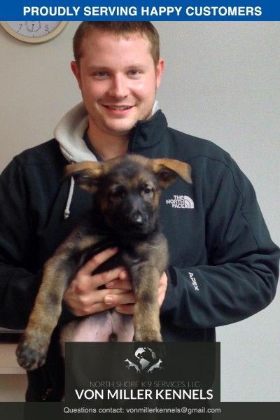 Man holding a German Shepherd puppy, with “Von Miller Kennels” text at the bottom.