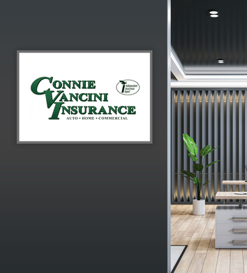 Office sign for Connie Vancini Insurance Agency LLC in a modern lobby