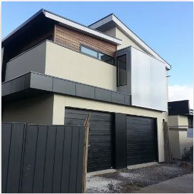 A house with two garage doors and a balcony | House Building Services | Clifton Springs