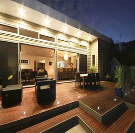 A house with a dining table and chairs on the deck | House Building Services | Clifton Springs