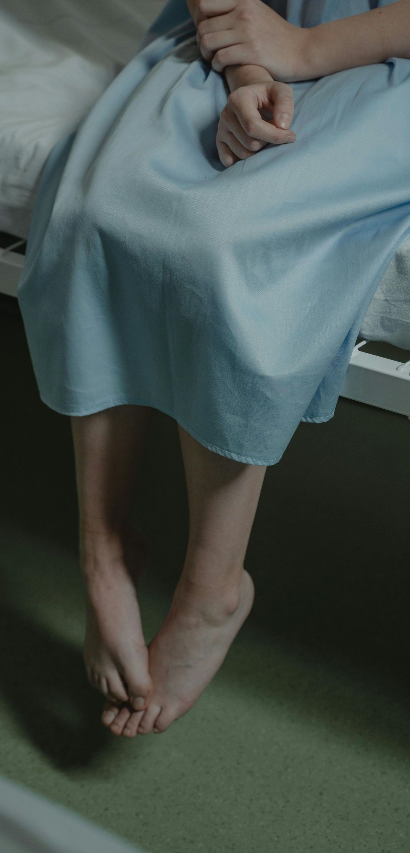 person in hospital gown