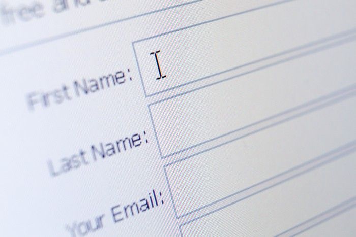 Form with fields for first name, last name, and email, with a cursor blinking in the first name field.