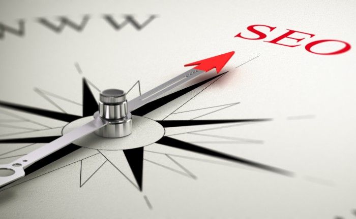 Compass pointing to the word