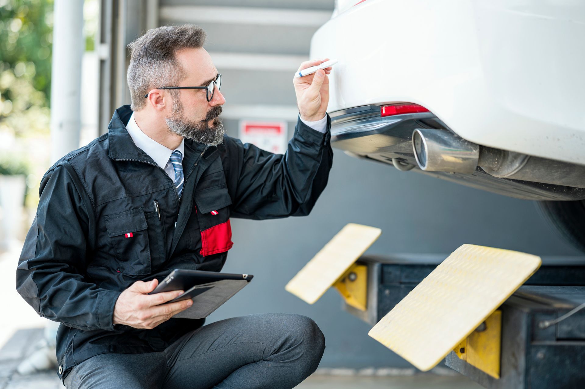 Inspecting Car — Hudson, FL — Florian Insurance, Inc.