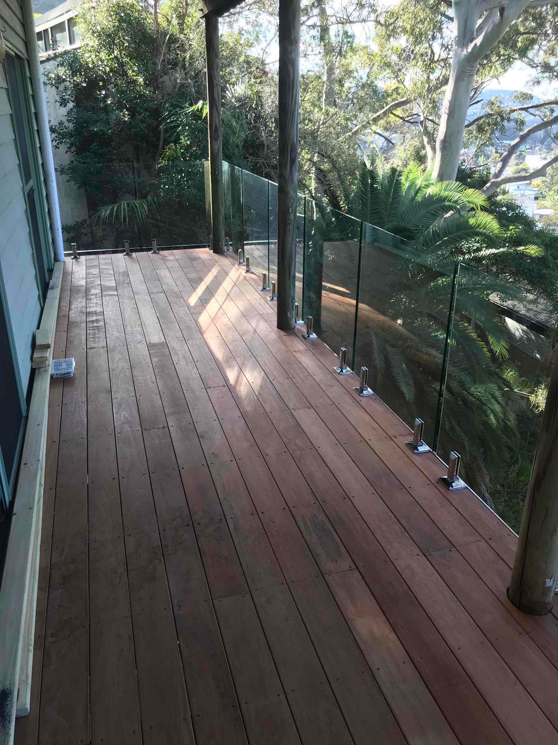 Wooden Deck Walkway With Glass Railing — Lakecrest Projects in Belmont North, NSW