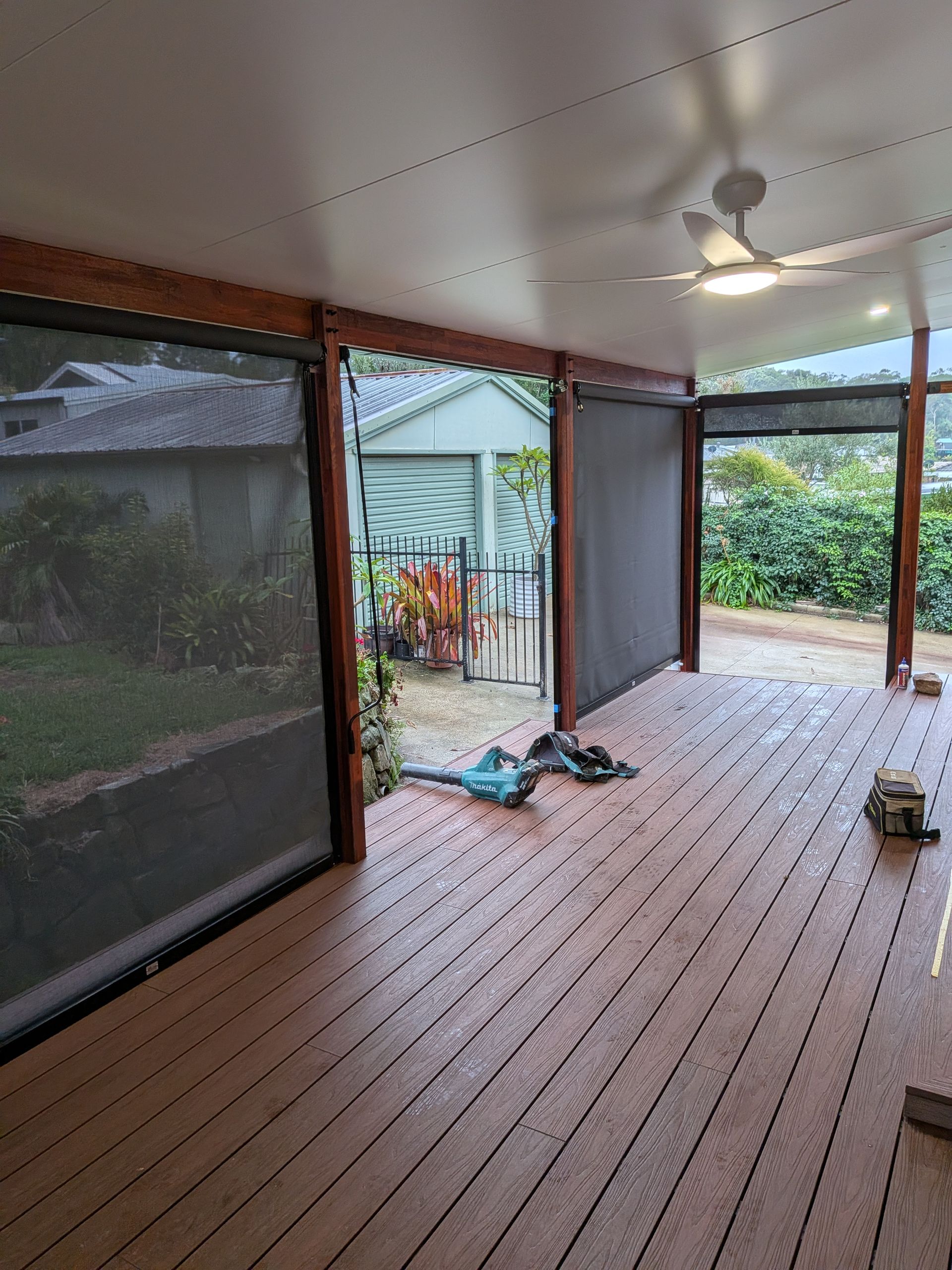 Covered Wooden Patio With Screen Walls — Lakecrest Projects in Belmont North, NSW
